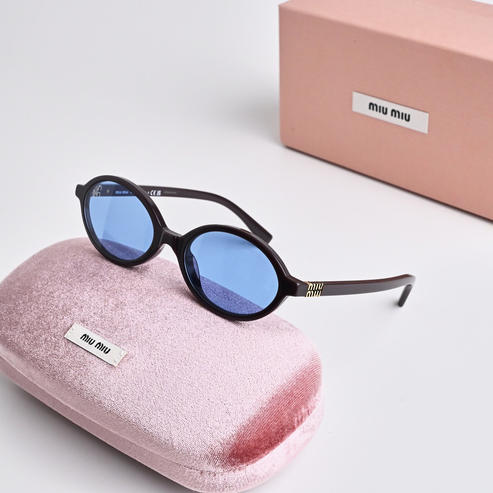 MIU MIU MU 04ZS 22C60O BROWN LIGHT BLUE