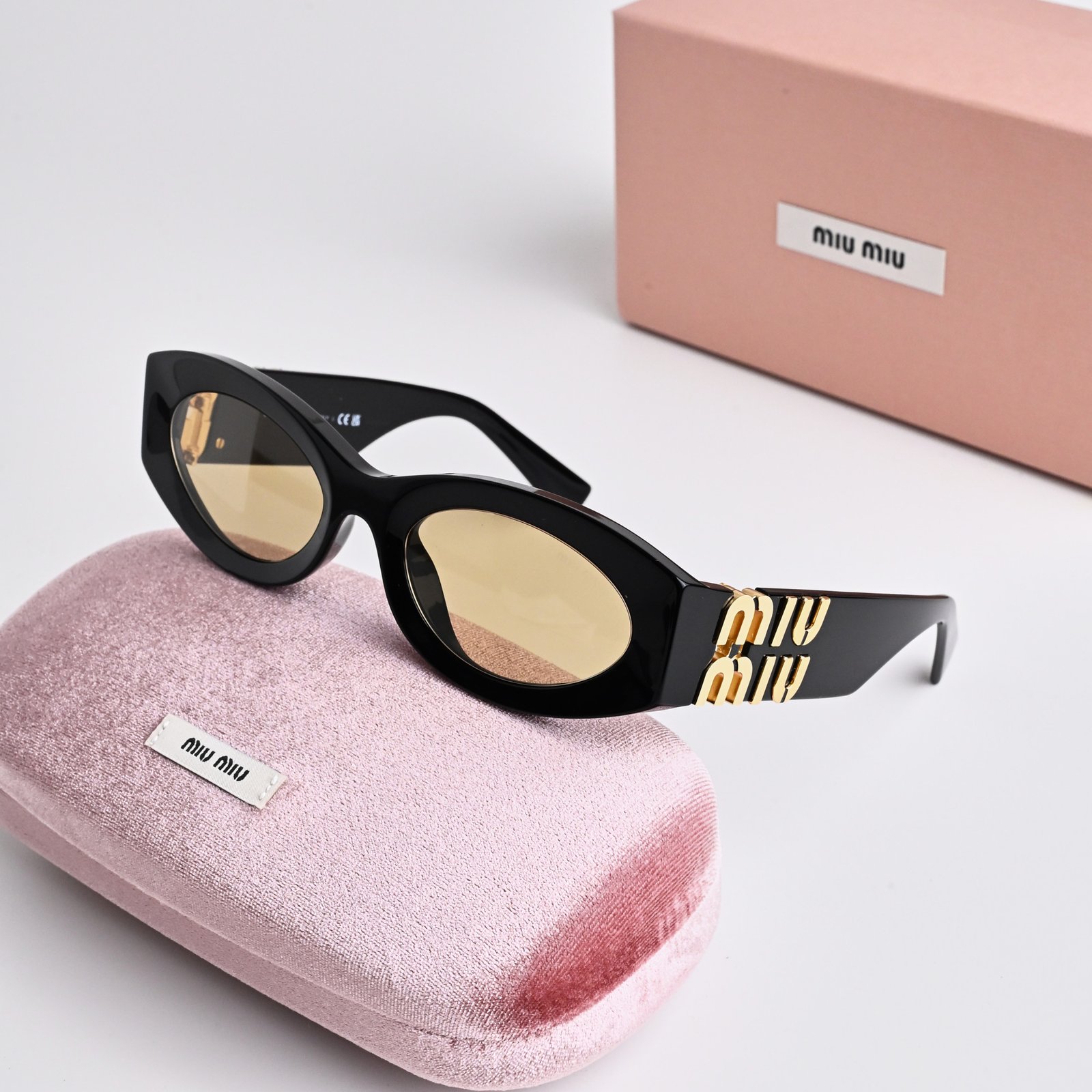 MIU MIU MU 11WS 16K10R BLACK ORANGE