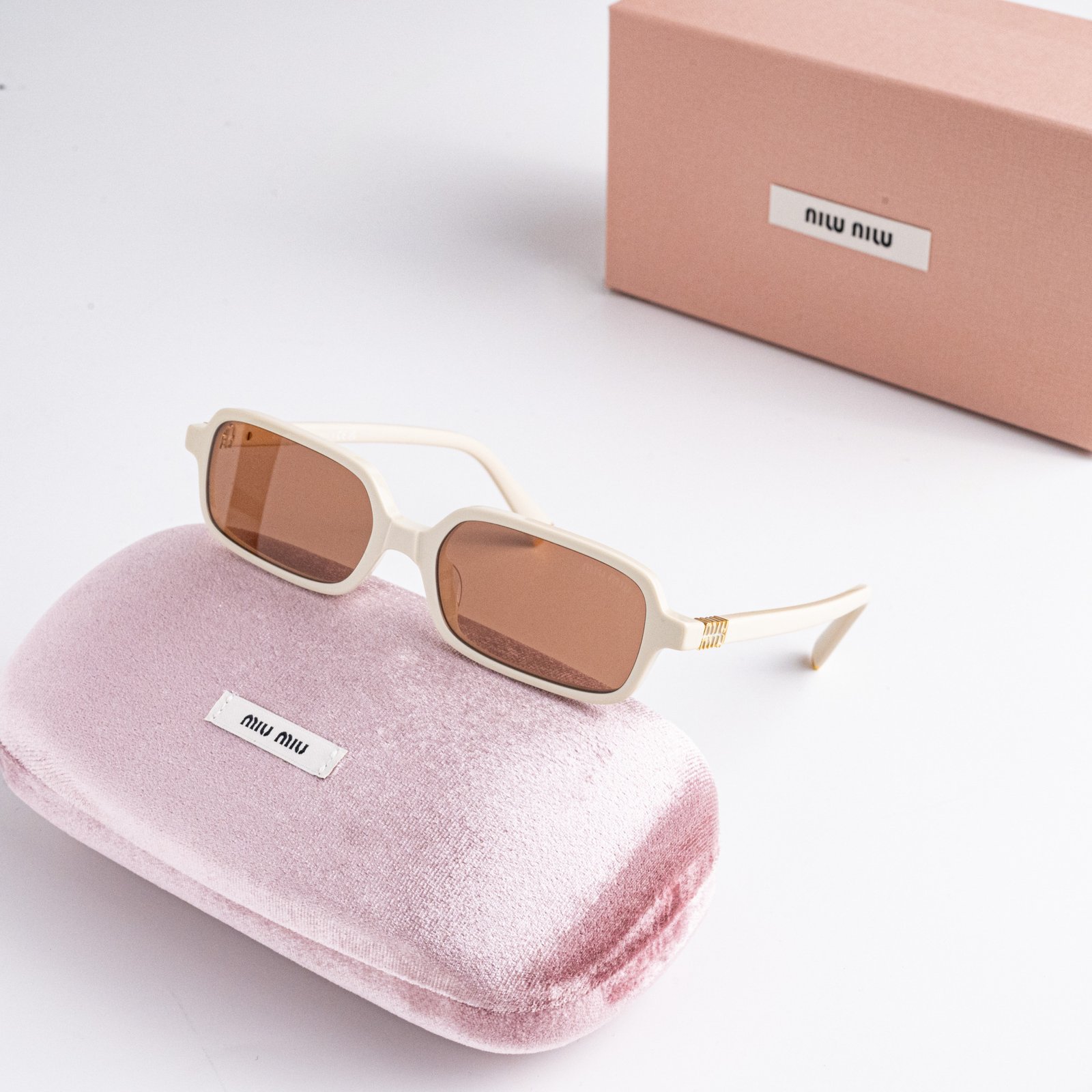 MIU MIU MU 11ZS 21D90Q MILK BROWN