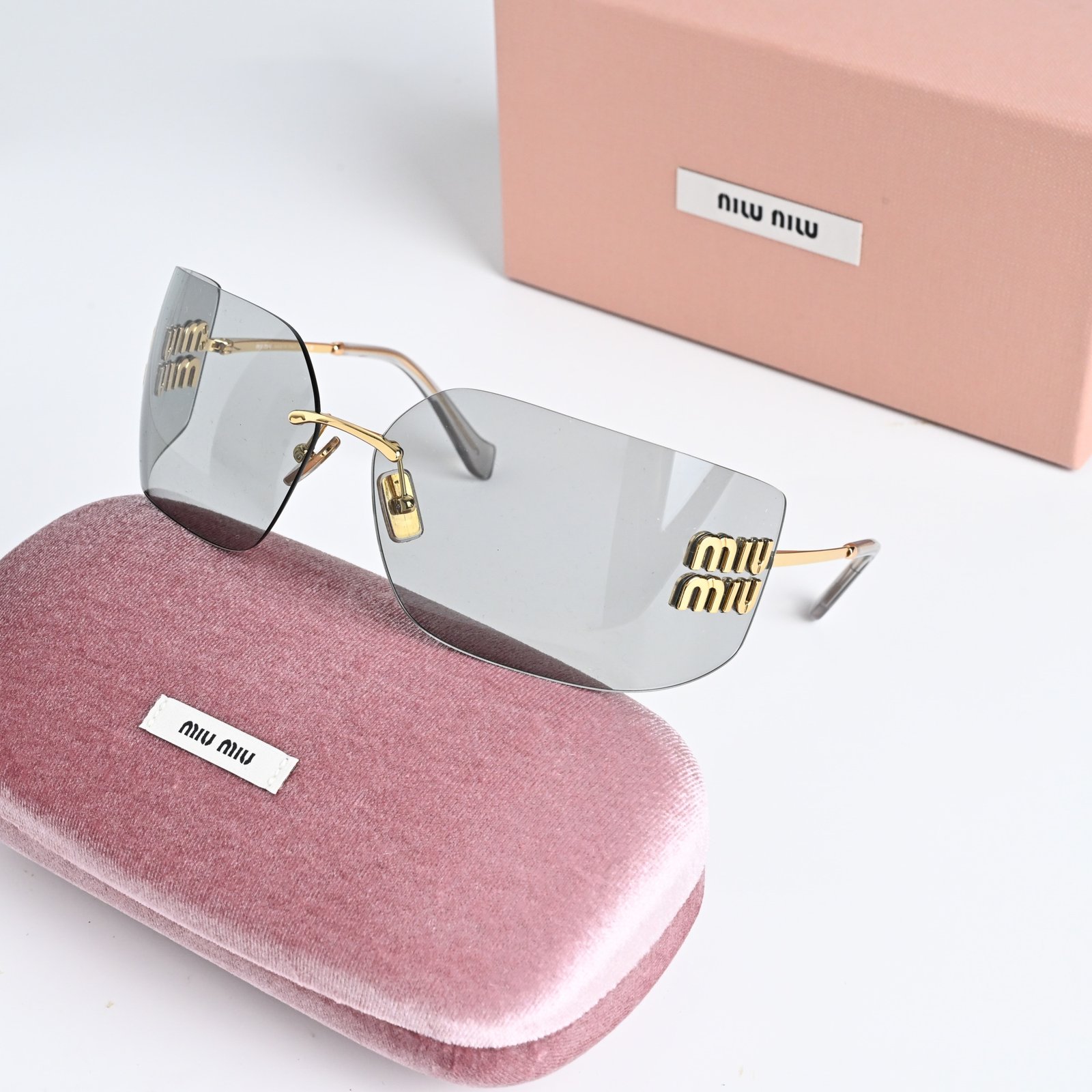 MIU MIU MU 54YS 5AK30B GOLD LIGHT GREY