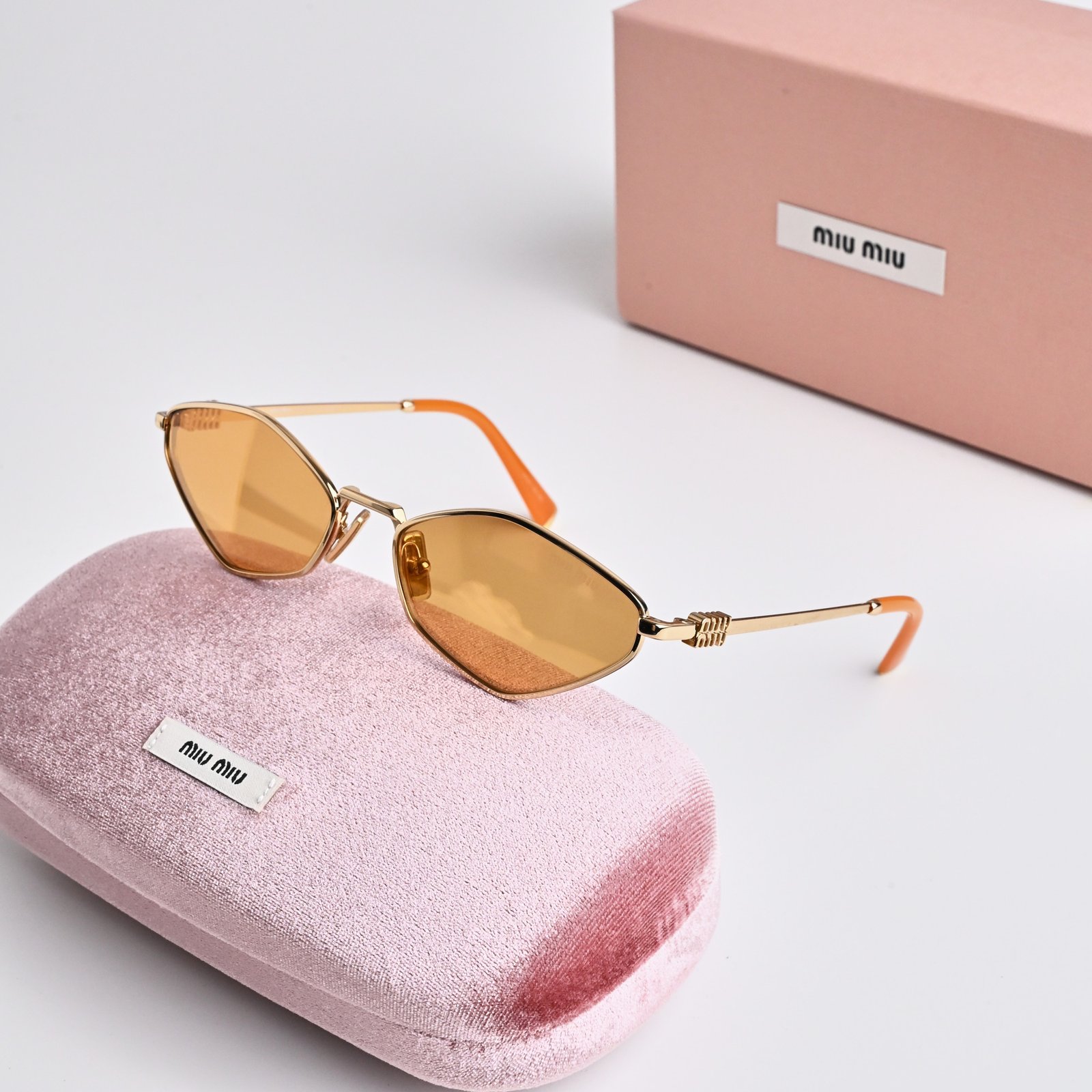 MIU MIU MU 56ZS 5AK40D GOLD LIGHT ORANGE