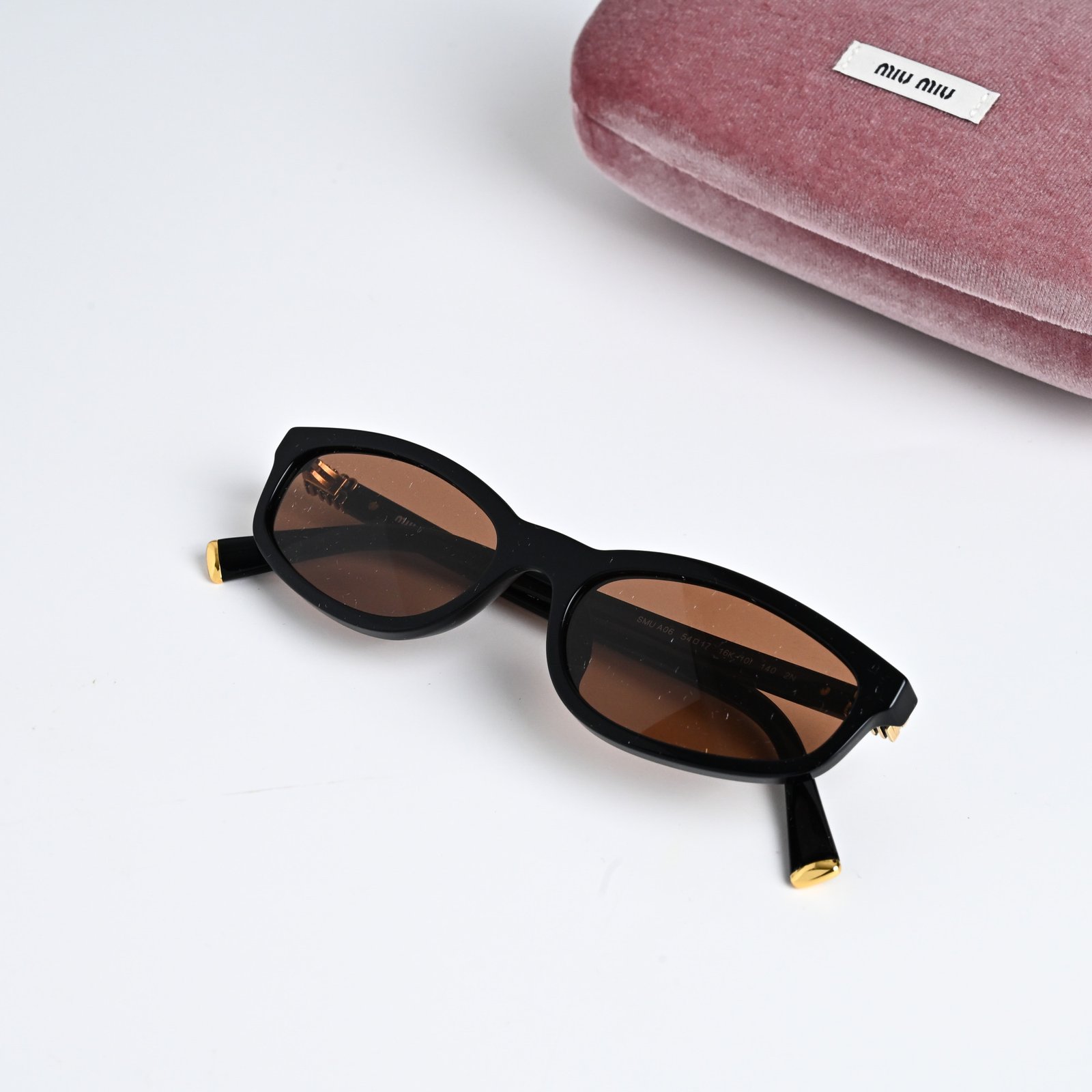 MIU MIU MU A06S 16K10I BLACK ORANGE (3)