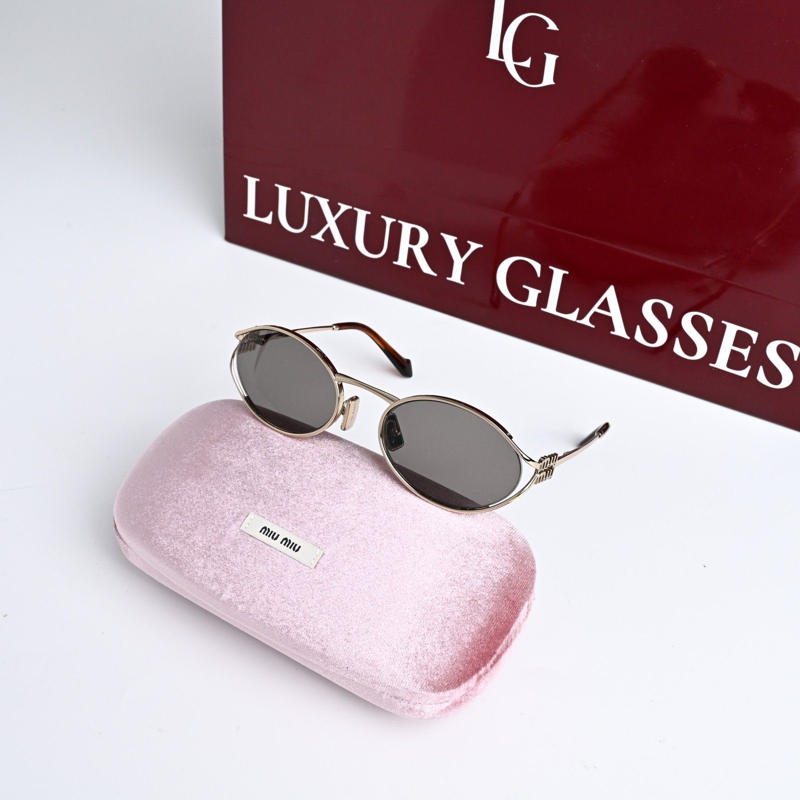 MIU MIU MU 52YS ZVN80Q PALE GOLD DARK GREY