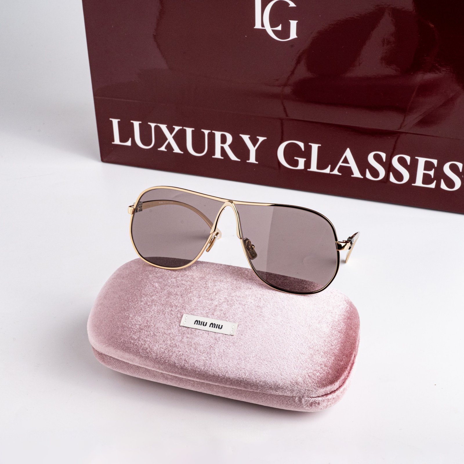 MIU MIU MU A56S 5AK20I LIGHT PURPLE BROWN