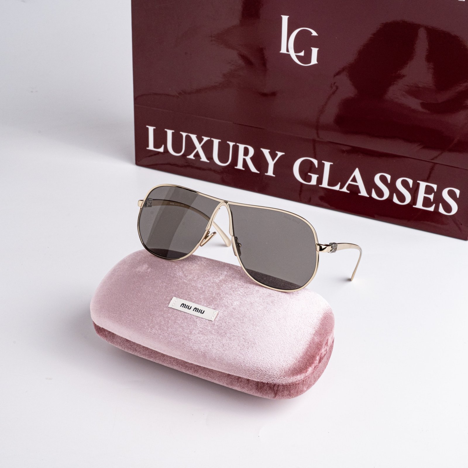 MIU MIU MU A56S ZVN80Q PALE GOLD DARK GREY