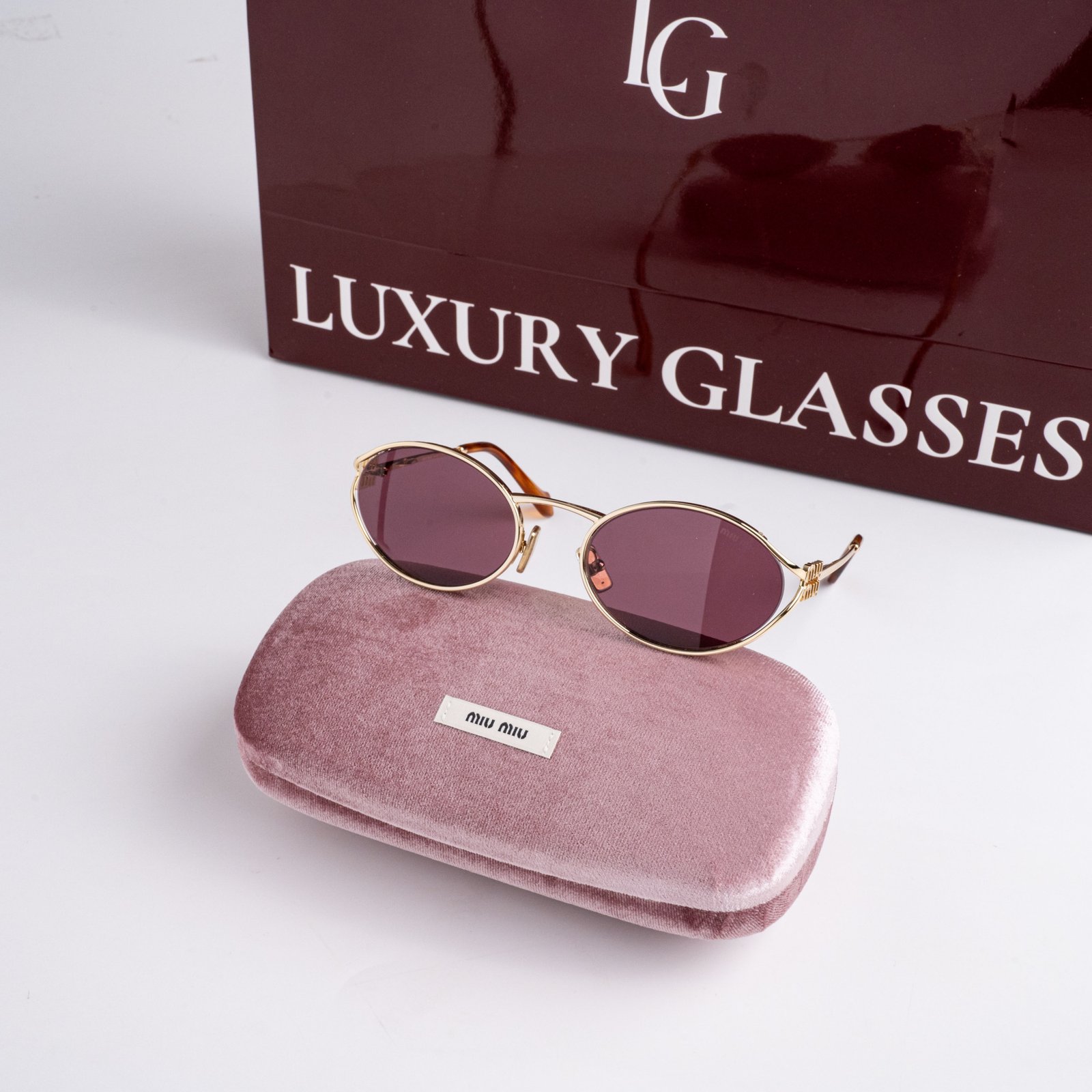 MIU MIU 0MU 52YS 5AK20Y GOLD DARK VIOLET