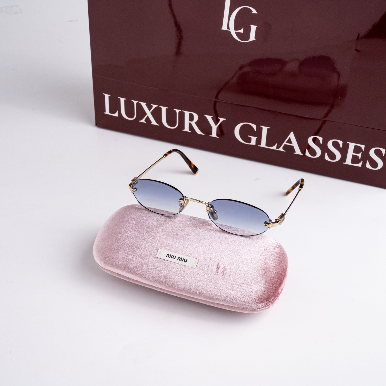 MIU MIU MU A54S ZVN80O PALE GOLD LIGHT BLUE