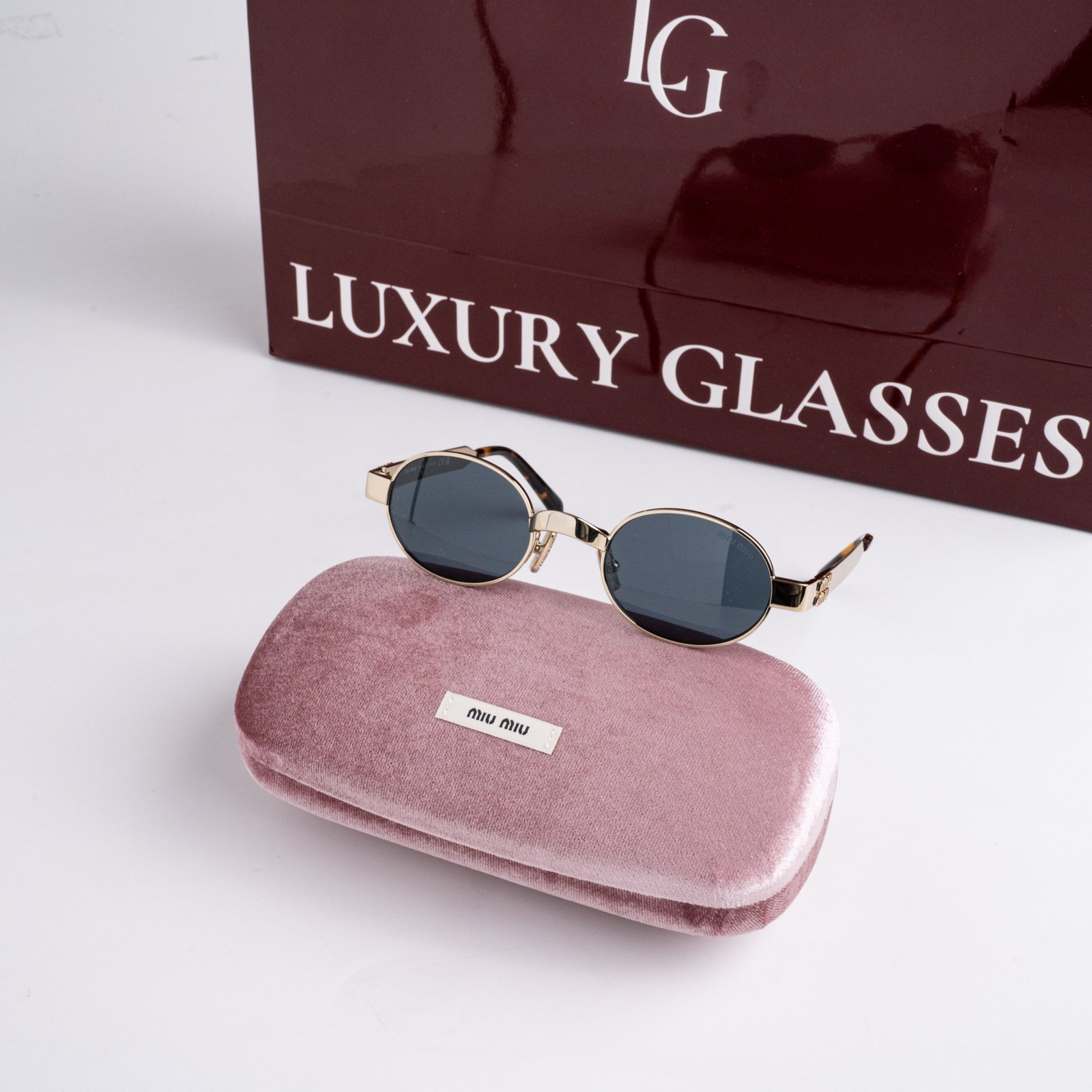 MIU MIU MU B51S ZVN70B PALE GOLD DARK GREY